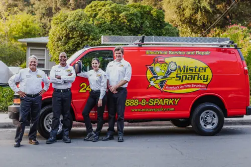 Mister Sparky Electricians in fromt of service van